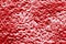 Texture of friable red snow