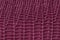 Texture of genuine leather close-up, embossed under the skin of reptile, burgundy color, fashion background