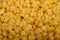 The texture of the grains of sweet corn. The pattern for the background. Fitness diet. Healthy diet. For a sweet treat. Close up