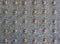 Texture of granite slab with rivets