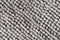 Texture of a gray blanket made of small balls