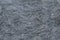 Texture gray granite rough untreated natural stone with white impregnations background natural