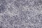 Texture of a gray stone-washed denim fabric