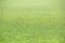 Texture green grass for football sport. Bright solar soccer field, sport texture. Soccer field with beautiful sunlight, bokeh and