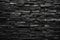texture illustration of black colored brick wall background. Generative AI