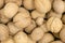 Texture of inshell walnuts close-up