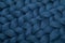 texture of knitted natural wool in blue