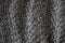 Texture of knitted wool grey fabric