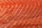 Texture of the meat of salmon is filmed close up