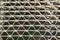 Texture of Metal industrial grade steel plate or floor grating There is a lattice drainage system.