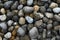 Texture of multicolored oval rhinestones oval pebbles