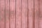 Texture Of Narrow pastel red Boards. Old Weathered Shabby pink Wooden Background.