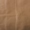 texture of natural crumpled brown paper. background