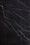 The texture of natural stone is black marble with patterns and white stripes, the stone is called Nero Marquina