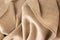 Texture of natural wool beige fabric. Cashmere. Lana madeja natural