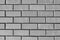 The texture of the new brickwork. Bricks background for design template. Brick wall.