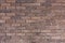 Texture of the old closeup brown brick wall