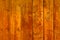 Texture of old ginger wooden plank. Natural wood background