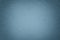 Texture of old gray paper background, closeup. Structure of dense light blue cardboard