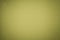 Texture of old olive paper background, closeup. Structure of dense light green cardboard.
