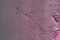 Texture of a painted wall. cement plate purple color background.