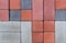 The texture of the paving bricks of different colors for construction. Facing building material