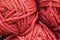 Texture of pink fluffy woolen threads for knitting