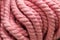 Texture of pink fluffy woolen threads for knitting