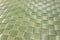 Texture of plastic green woven mat
