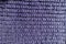 Texture of purple handmade rib knit fabric