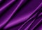 Texture of a purple silk fabric.