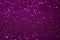 Texture of purple sparkles  close up  bright colorful texture  selective artistic focus