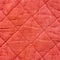 Texture of red quilted fabric