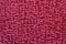 Texture of red velor fabric close up