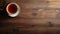 Texture-rich Surfaces: Aerial View Of Dark Brown And Orange Tea On Wooden Table