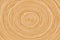 Texture of a round ornament on a wooden board, rotation background with a wood pattern