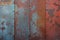 Texture Rusty metal wall with multicolored paint background, aged appearance