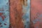 Texture Rusty metal wall with multicolored paint background, aged appearance