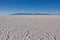Texture of salt of the saline land Salar de Uyuni in Bolivia