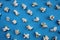 Texture salty crunchy freshly cooked popcorn on a blue background