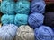 Texture of skeins of yarn in blue tones.