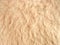 Texture of soft beige fleecy fabric