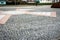 The texture of stone walkway. Cement brick squared stone floor background. Concrete paving slabs