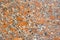 Texture - the surface of a granite slab with orange impregnations