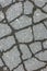 Texture of tarmac road with cracks - abstract background and texture