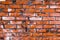 The texture of uneven masonry. Rectangular background brickwork.