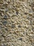 Texture of very weathered outdoor concrete aggregate.