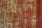 Texture of vintage rusty white iron wall background with many layers of paint