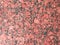 Texture of wall of polished pink granite