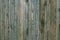 Texture of weathered gray green wooden boards. Vintage wood pattern, surface. Dirty shabby timber, oak, pine. Hardwood grey backgr